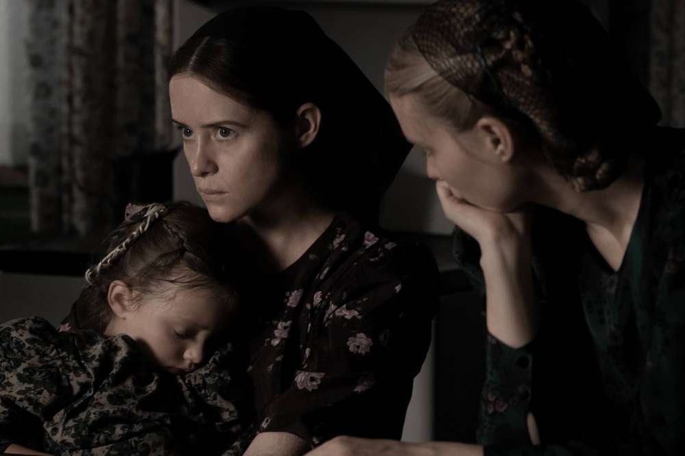 WT_08399_R (l-r.) Emily Mitchell stars as Miep, Claire Foy as Salome and Rooney Mara as Ona in director Sarah Polley’s filmWOMEN TALKINGAn Orion Pictures ReleasePhoto credit: Michael Gibson© 2022 ...